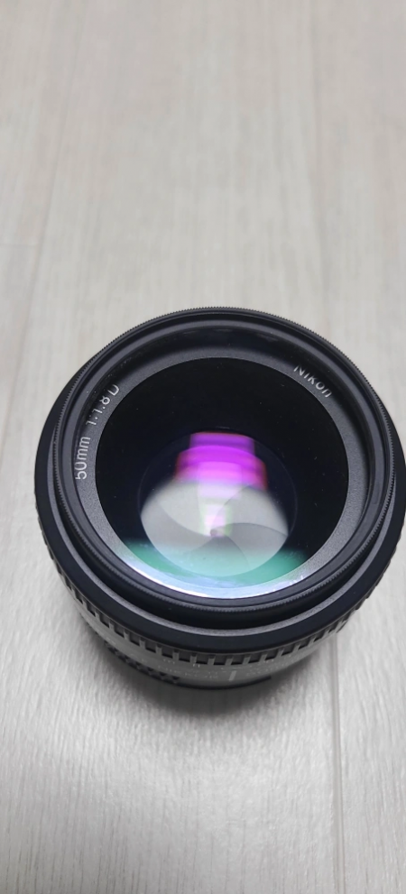 니콘렌즈 및 플레쉬라이트 팝니다.